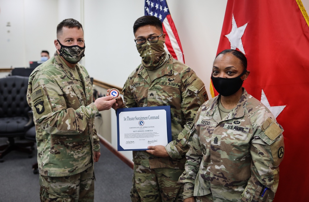 Sgt. Cortez Receives COA and 1st TSC Coin