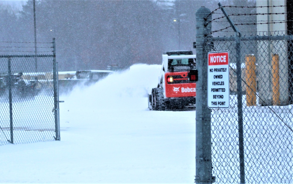 RTS-Maintenance Soldier clears snow at Fort McCoy