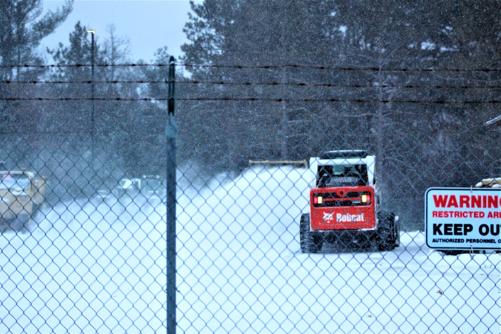 RTS-Maintenance Soldier clears snow at Fort McCoy