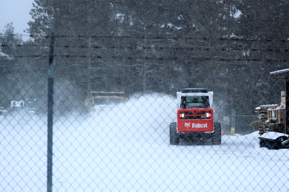 RTS-Maintenance Soldier clears snow at Fort McCoy