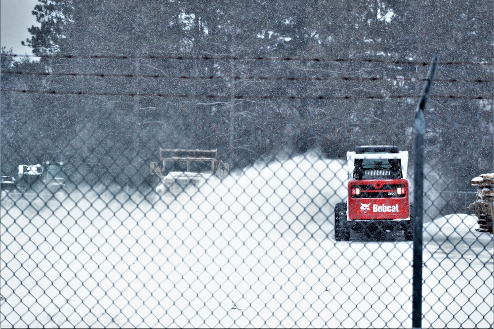 RTS-Maintenance Soldier clears snow at Fort McCoy