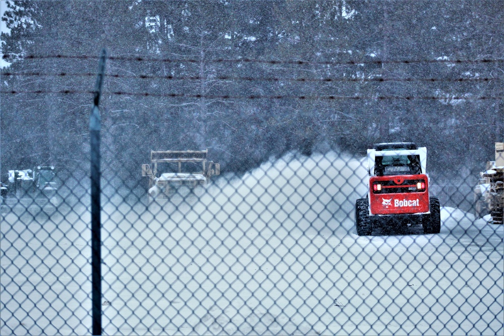 RTS-Maintenance Soldier clears snow at Fort McCoy