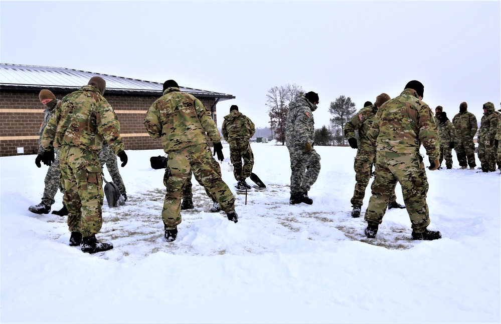 Tent training for Cold-Weather Operations Course class 22-02 at Fort McCoy