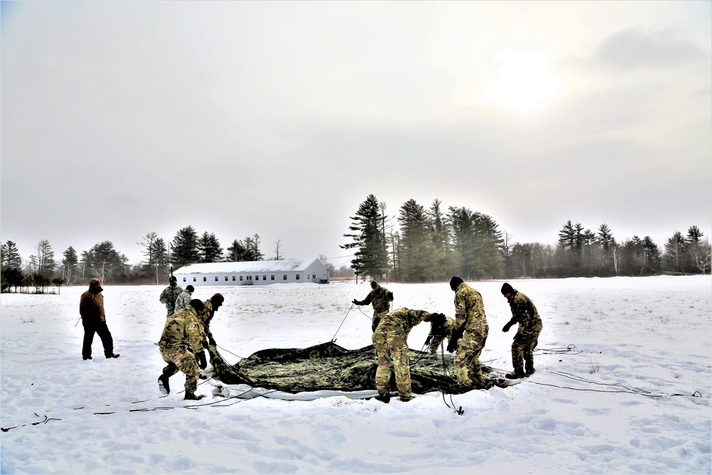 Soldiers learn to build Arctic tents during CWOC training at Fort McCoy