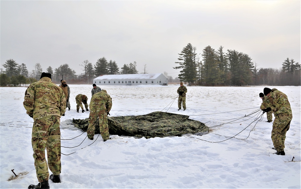 Soldiers learn to build Arctic tents during CWOC training at Fort McCoy