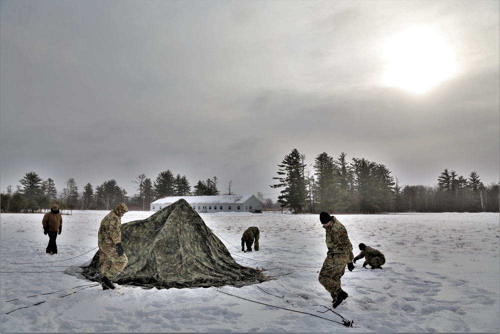 Soldiers learn to build Arctic tents during CWOC training at Fort McCoy