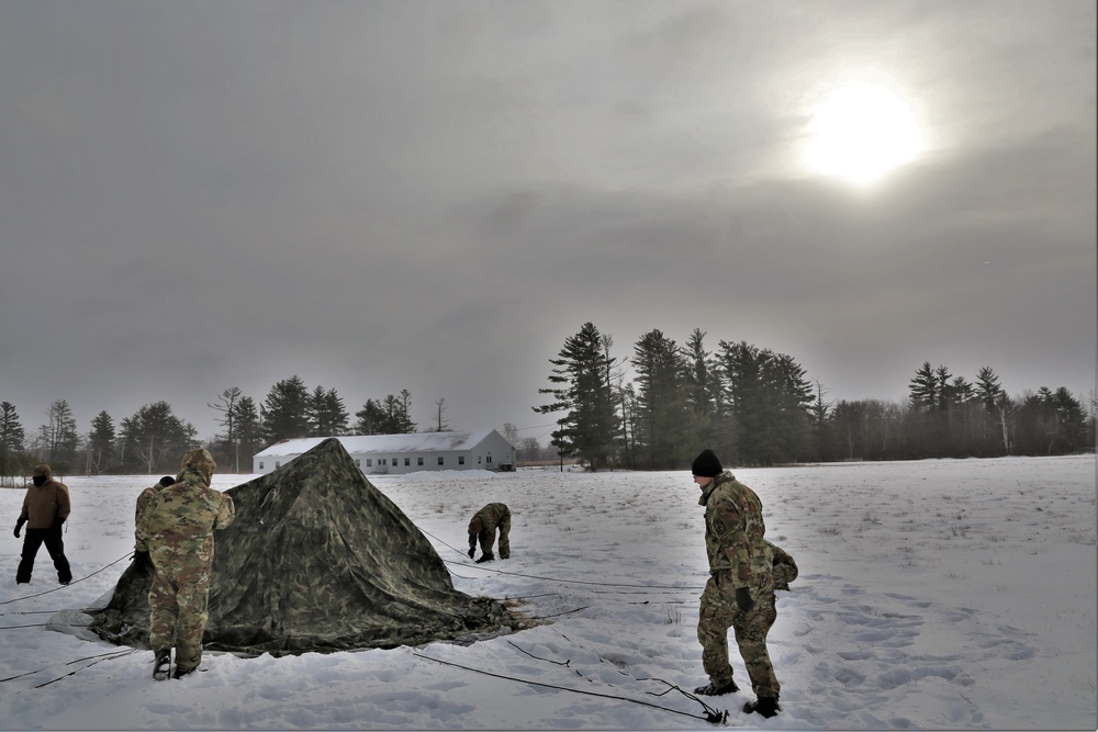 Soldiers learn to build Arctic tents during CWOC training at Fort McCoy