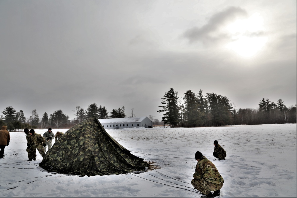 Soldiers learn to build Arctic tents during CWOC training at Fort McCoy