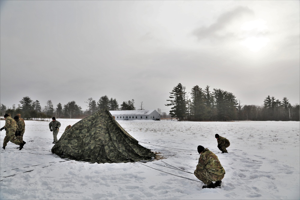 Soldiers learn to build Arctic tents during CWOC training at Fort McCoy