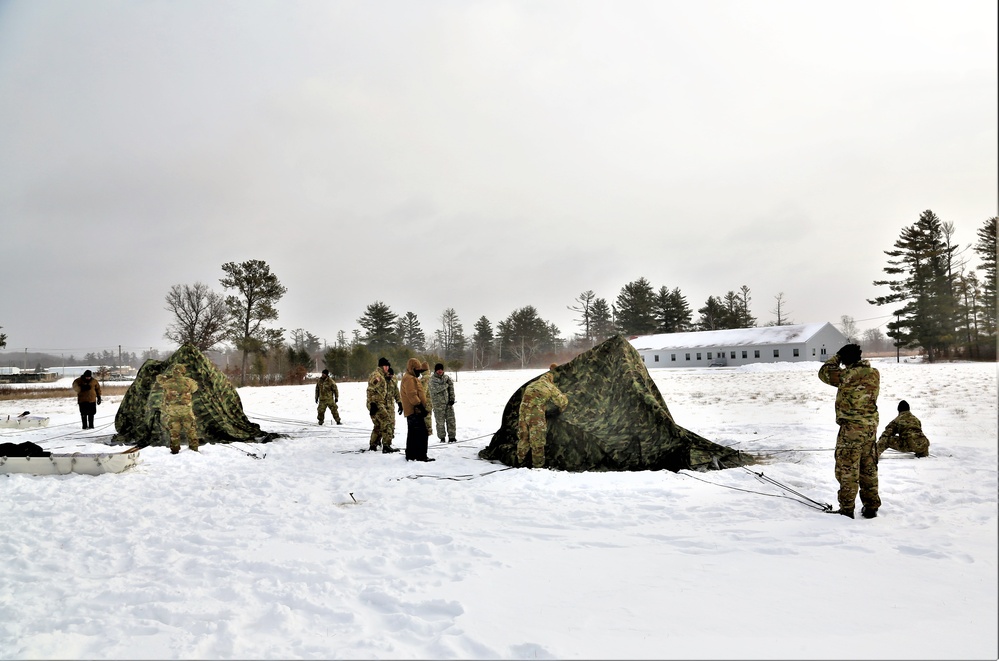 Soldiers learn to build Arctic tents during CWOC training at Fort McCoy