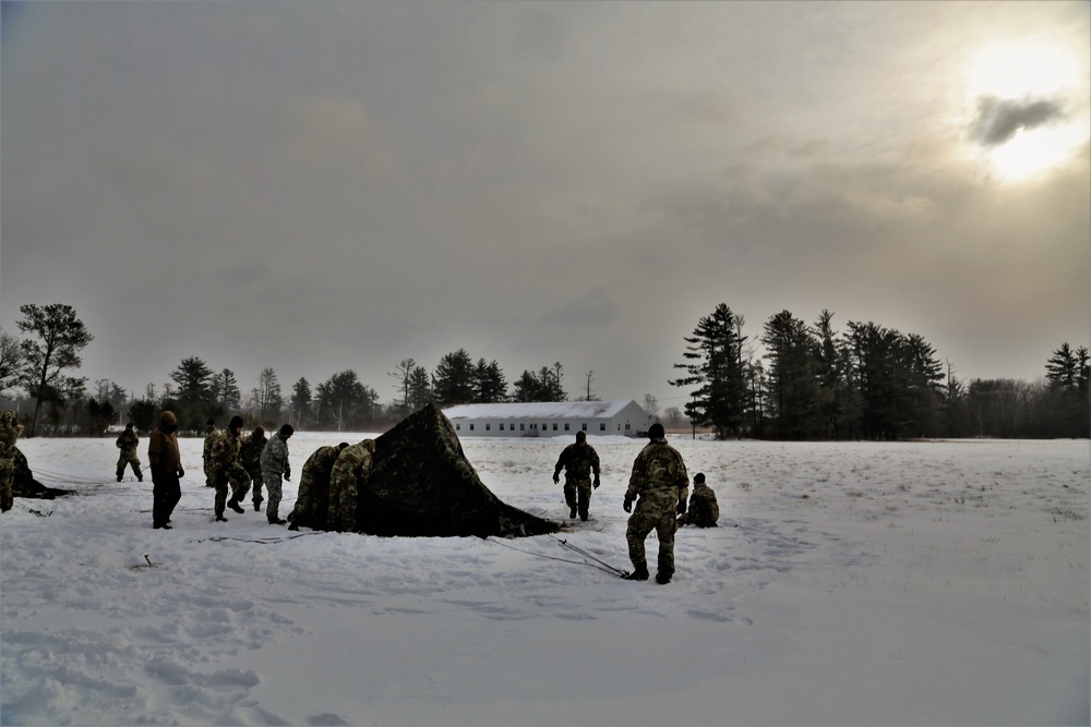 Soldiers learn to build Arctic tents during CWOC training at Fort McCoy