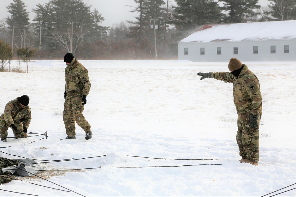 Soldiers learn to build Arctic tents during CWOC training at Fort McCoy