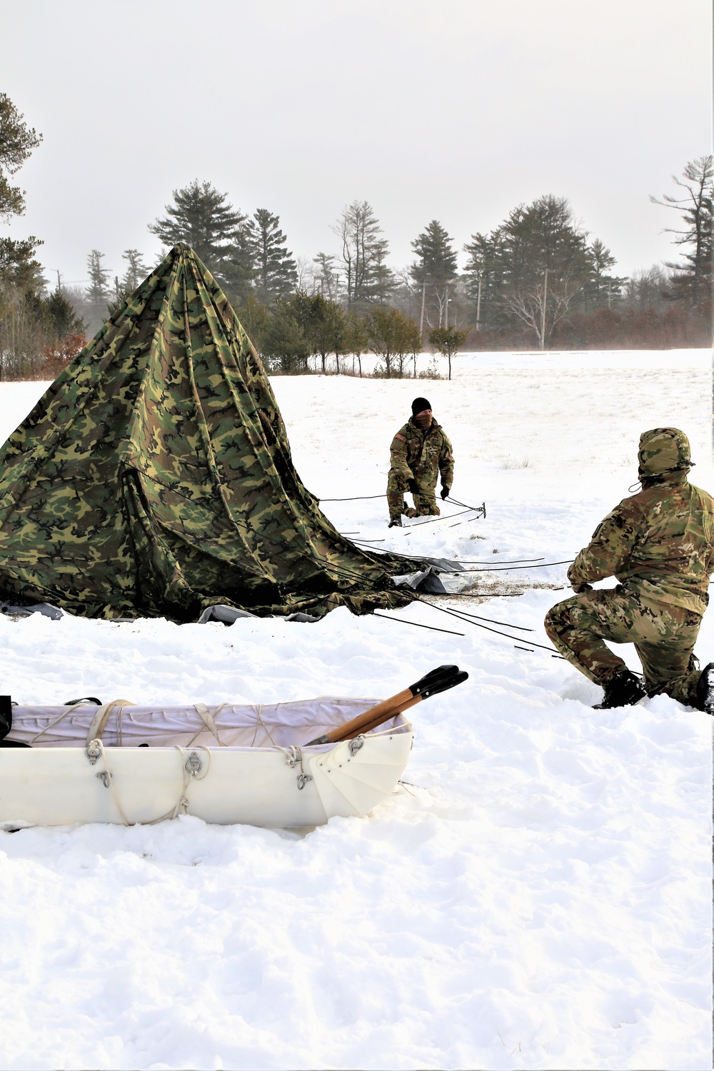 Soldiers learn to build Arctic tents during CWOC training at Fort McCoy