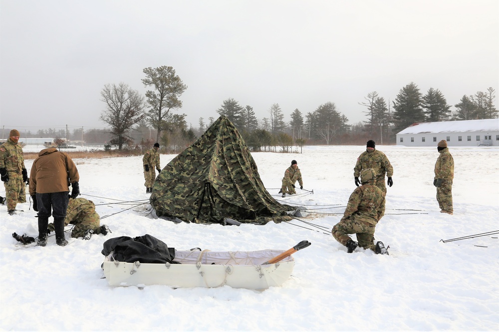 Soldiers learn to build Arctic tents during CWOC training at Fort McCoy