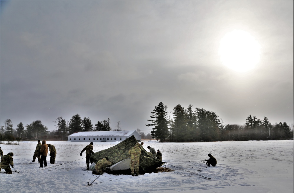 Soldiers learn to build Arctic tents during CWOC training at Fort McCoy