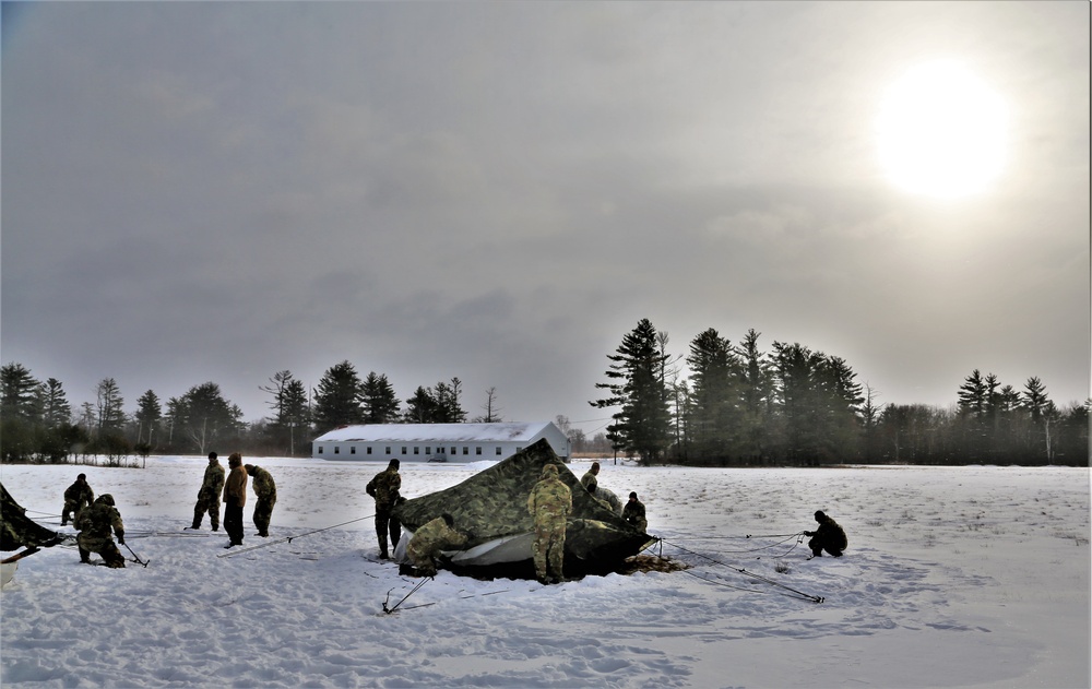 Soldiers learn to build Arctic tents during CWOC training at Fort McCoy