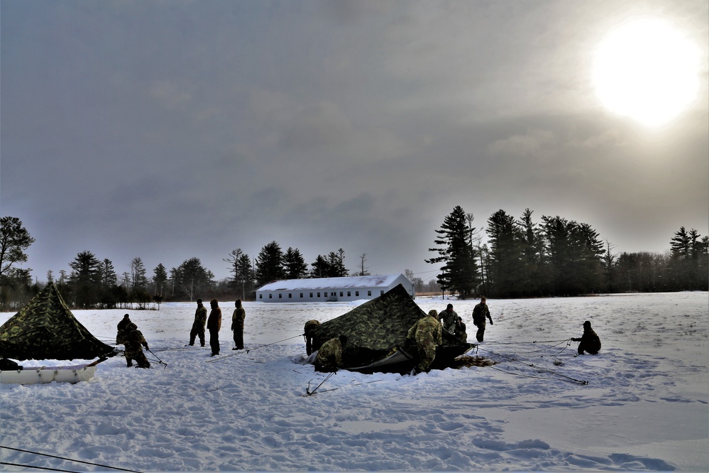 Soldiers learn to build Arctic tents during CWOC training at Fort McCoy