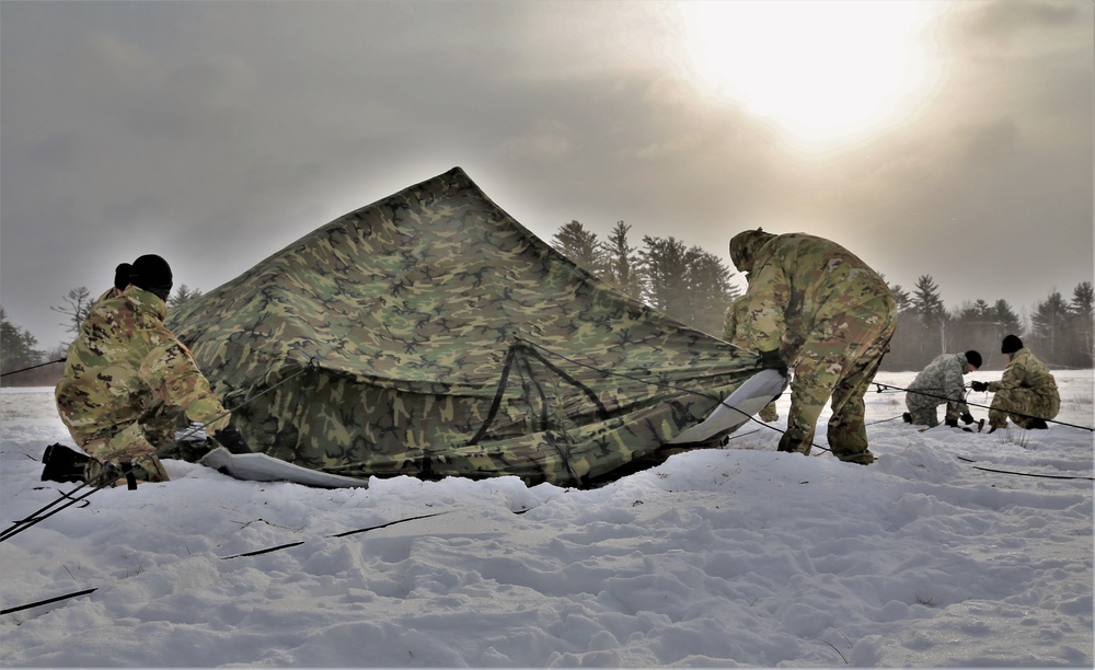 Soldiers learn to build Arctic tents during CWOC training at Fort McCoy