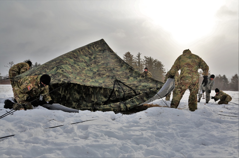 Soldiers learn to build Arctic tents during CWOC training at Fort McCoy