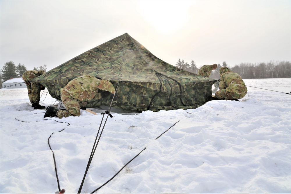 Soldiers learn to build Arctic tents during CWOC training at Fort McCoy