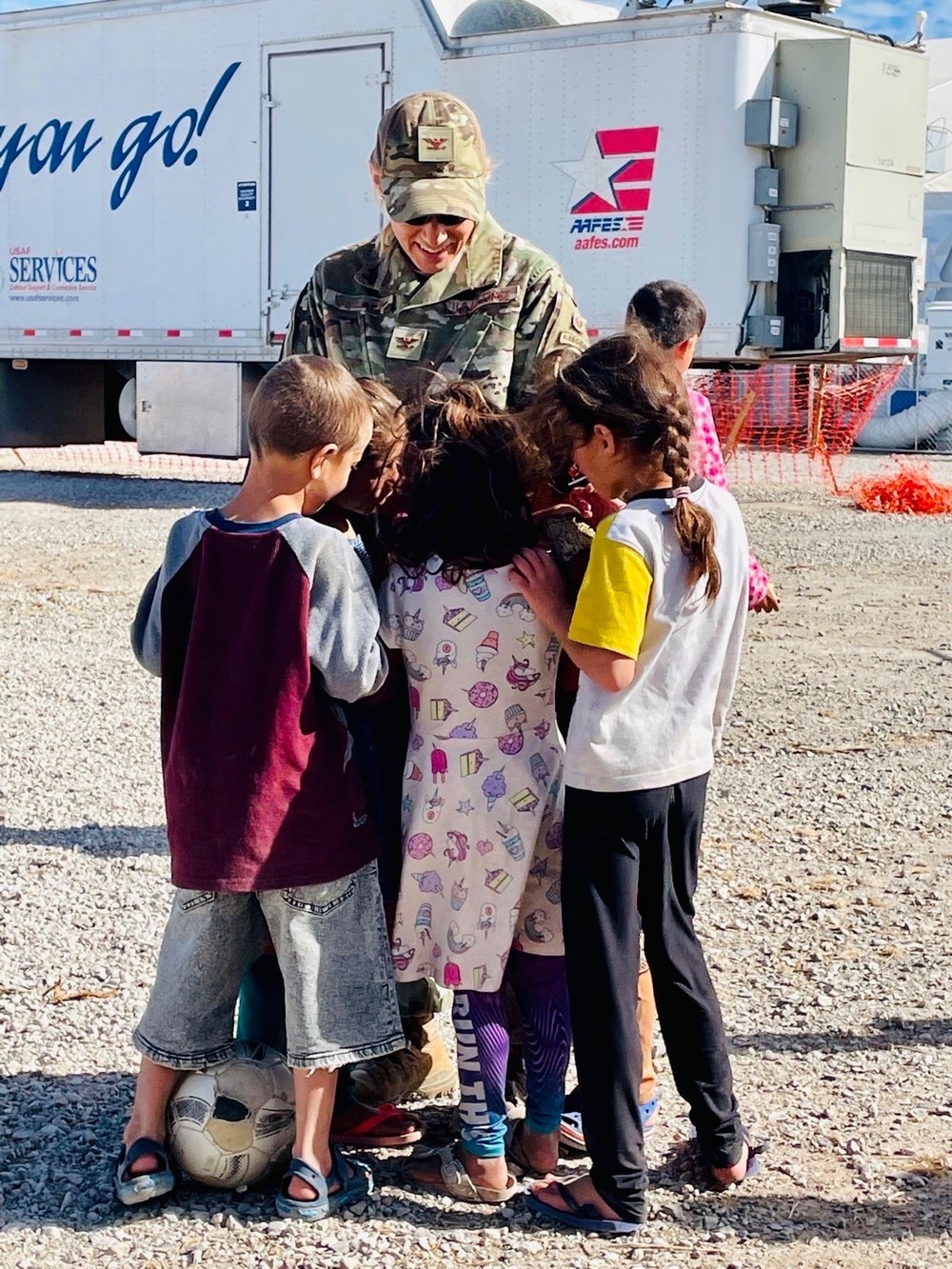Task Force Holloman vice commander interacts with Afghan evacuees