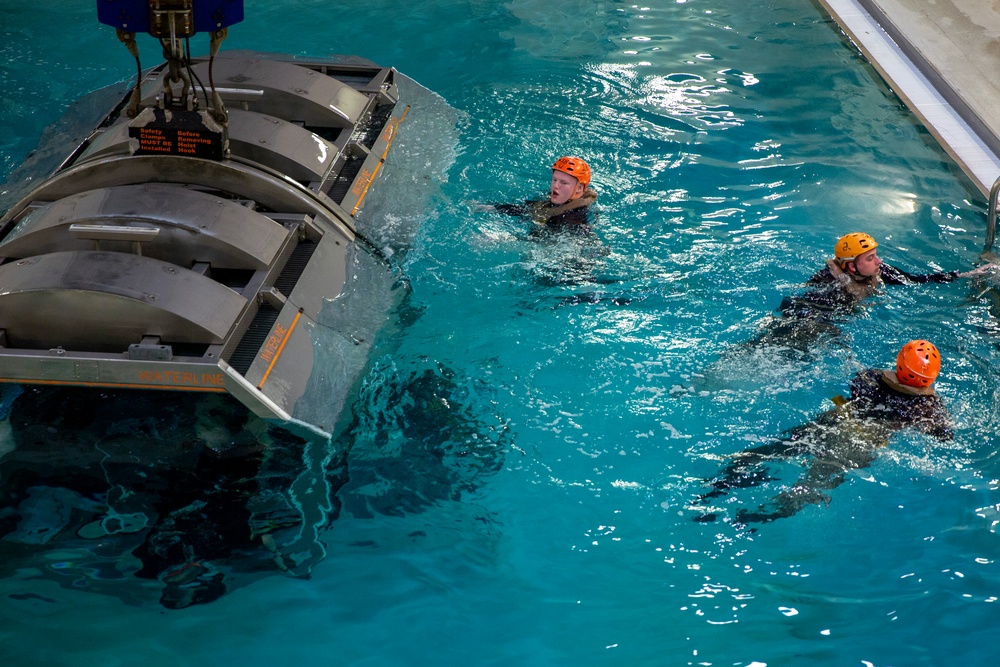 Marines with the 22nd MEU conduct Underwater Egress Training