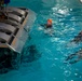 Marines with the 22nd MEU conduct Underwater Egress Training