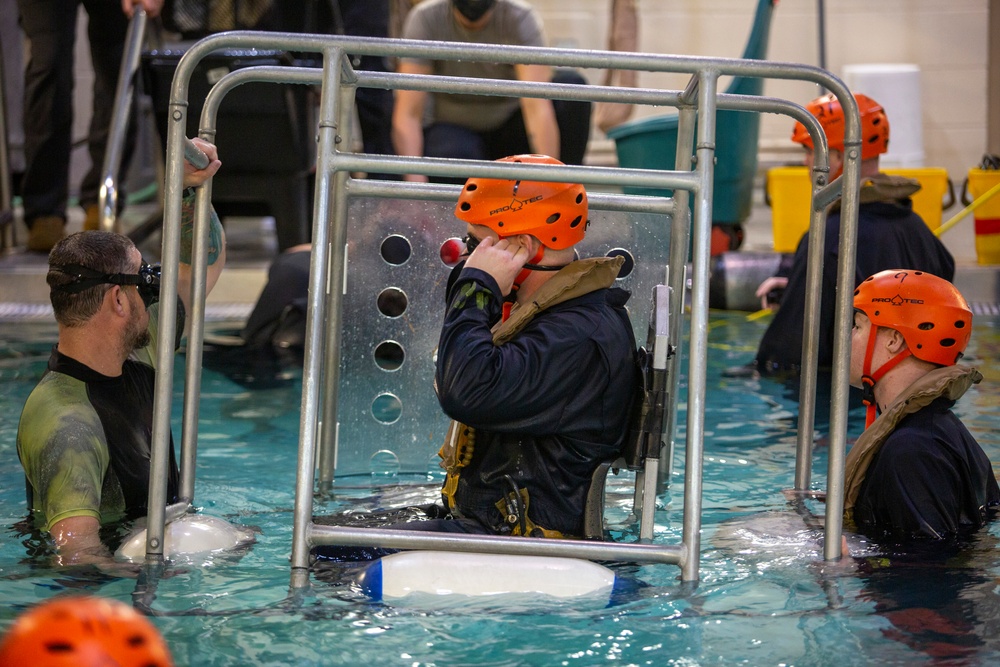 Marines with the 22nd MEU conduct Underwater Egress Training