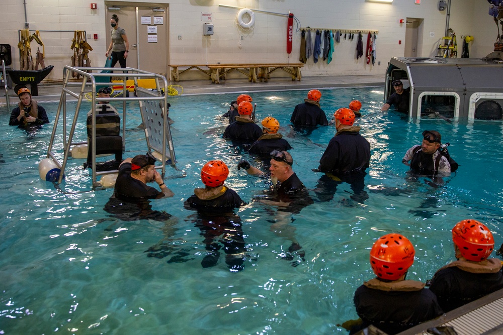 Marines with the 22nd MEU conduct Underwater Egress Training