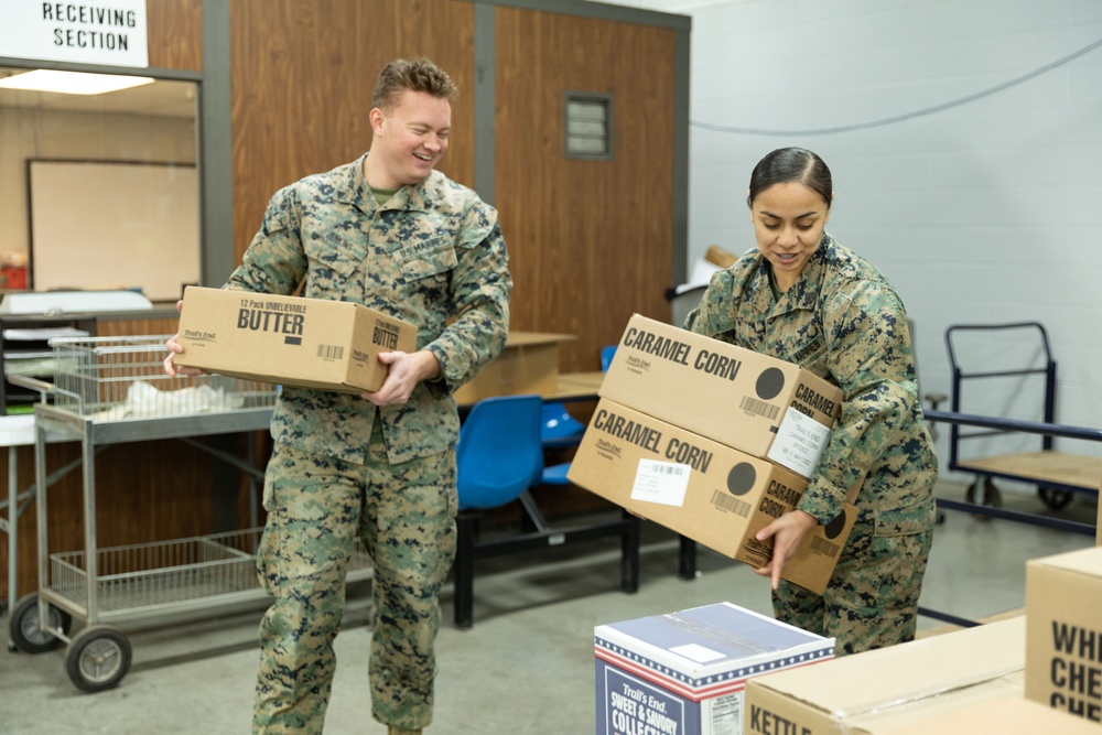 Boy Scouts donate popcorn to troops