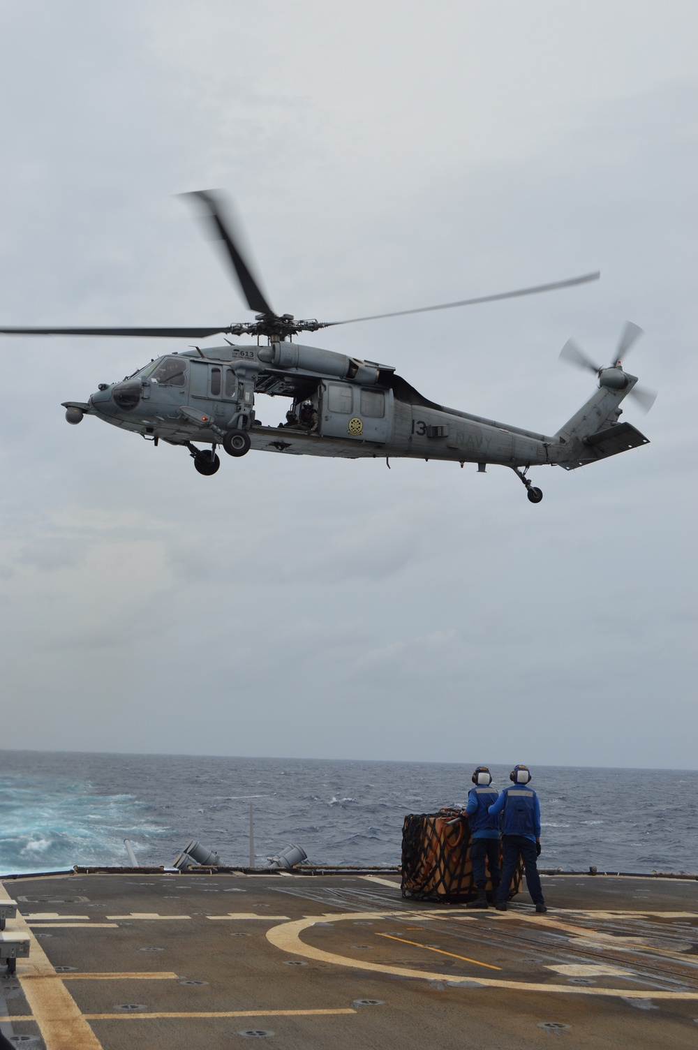 USS Lake Champlain conducts vertical replenishment-at-sea in the South China Sea