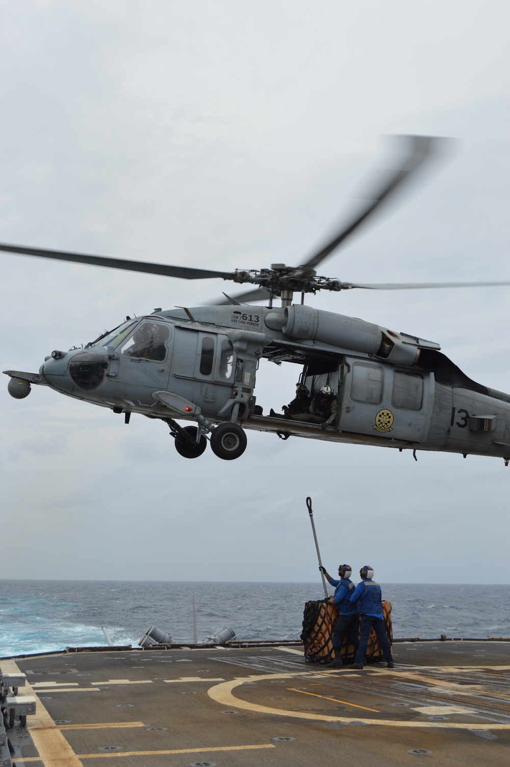 USS Lake Champlain conducts vertical replenishment-at-sea in the South China Sea