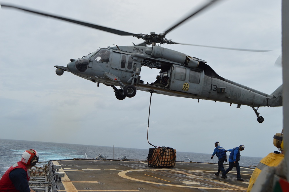 USS Lake Champlain conducts vertical replenishment-at-sea in the South China Sea