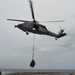 USS Lake Champlain conducts vertical replenishment-at-sea in the South China Sea