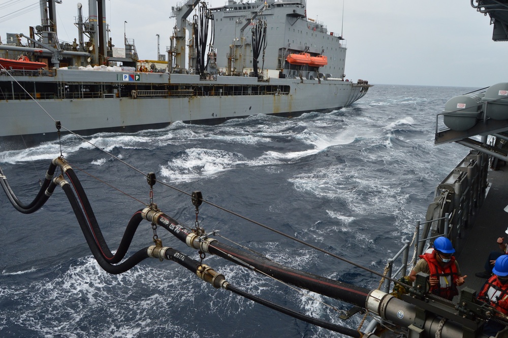 USS Lake Champlain conducts replenishment-at-sea in the South China Sea