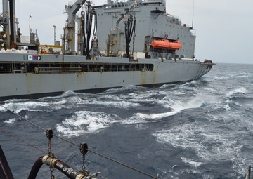 USS Lake Champlain conducts replenishment-at-sea in the South China Sea