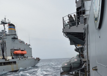 USS Lake Champlain conducts replenishment-at-sea in the South China Sea