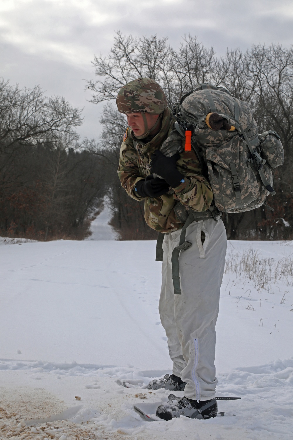 Adjusting his rucksack