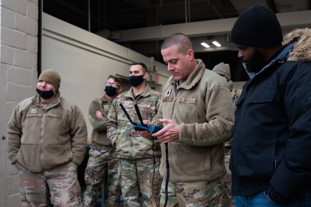 U.S. Air Force Lt. Col Mark Szatkowski tests an autonomous vehicle for flight line use