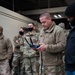 U.S. Air Force Lt. Col Mark Szatkowski tests an autonomous vehicle for flight line use