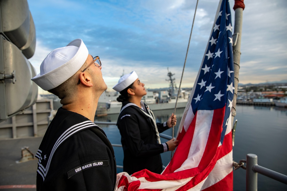 USS Makin Island Sailors Observe Colors