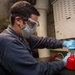 USS Carl Vinson (CVN 70) Sailor Performs Maintenance in South China Sea