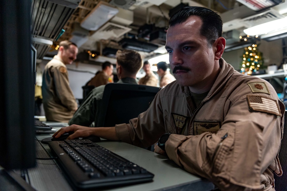 USS Carl Vinson (CVN 70) Sailors Conduct Air Plan Brief