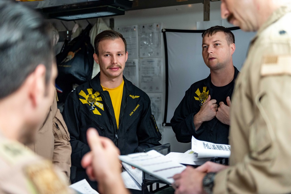 USS Carl Vinson (CVN 70) Sailors Conduct Air Plan Brief