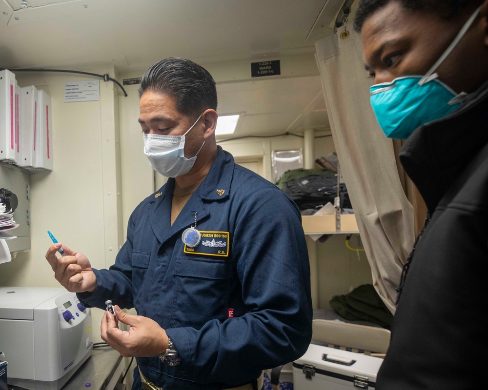 Sailors Aboard USS Ralph Johnson (DDG 114) Receive Covid-19 Booster Shots