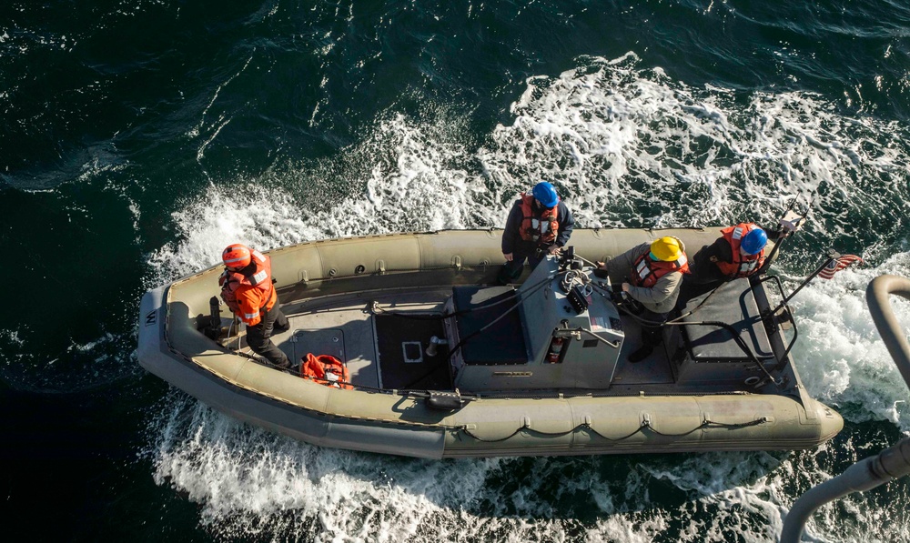 Sailors Aboard USS Ralph Johnson (DDG 114) Conduct Boat Operations