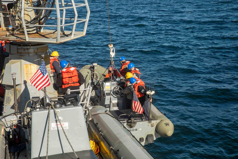 Sailors Aboard USS Ralph Johnson (DDG 114) Conduct Boat Operations