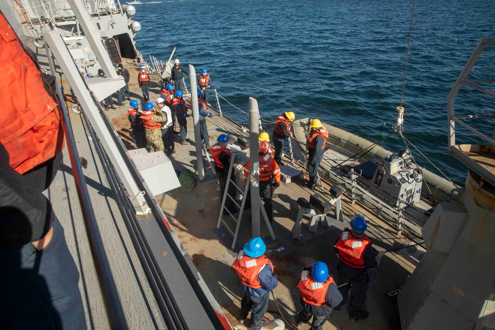 Sailors Aboard USS Ralph Johnson (DDG 114) Conduct Boat Operations