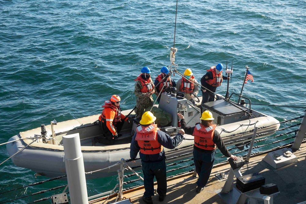 Sailors Aboard USS Ralph Johnson (DDG 114) Conduct Boat Operations