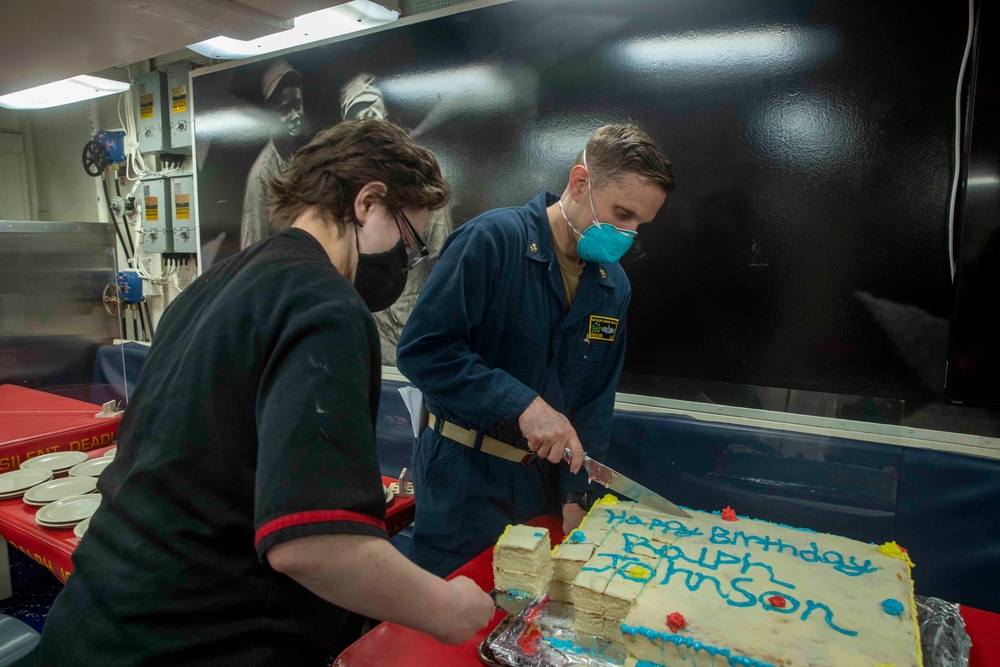 Sailors Aboard USS Ralph Johnson (DDG 114) Celebrate Birthday of Pfc. Ralph Johnson